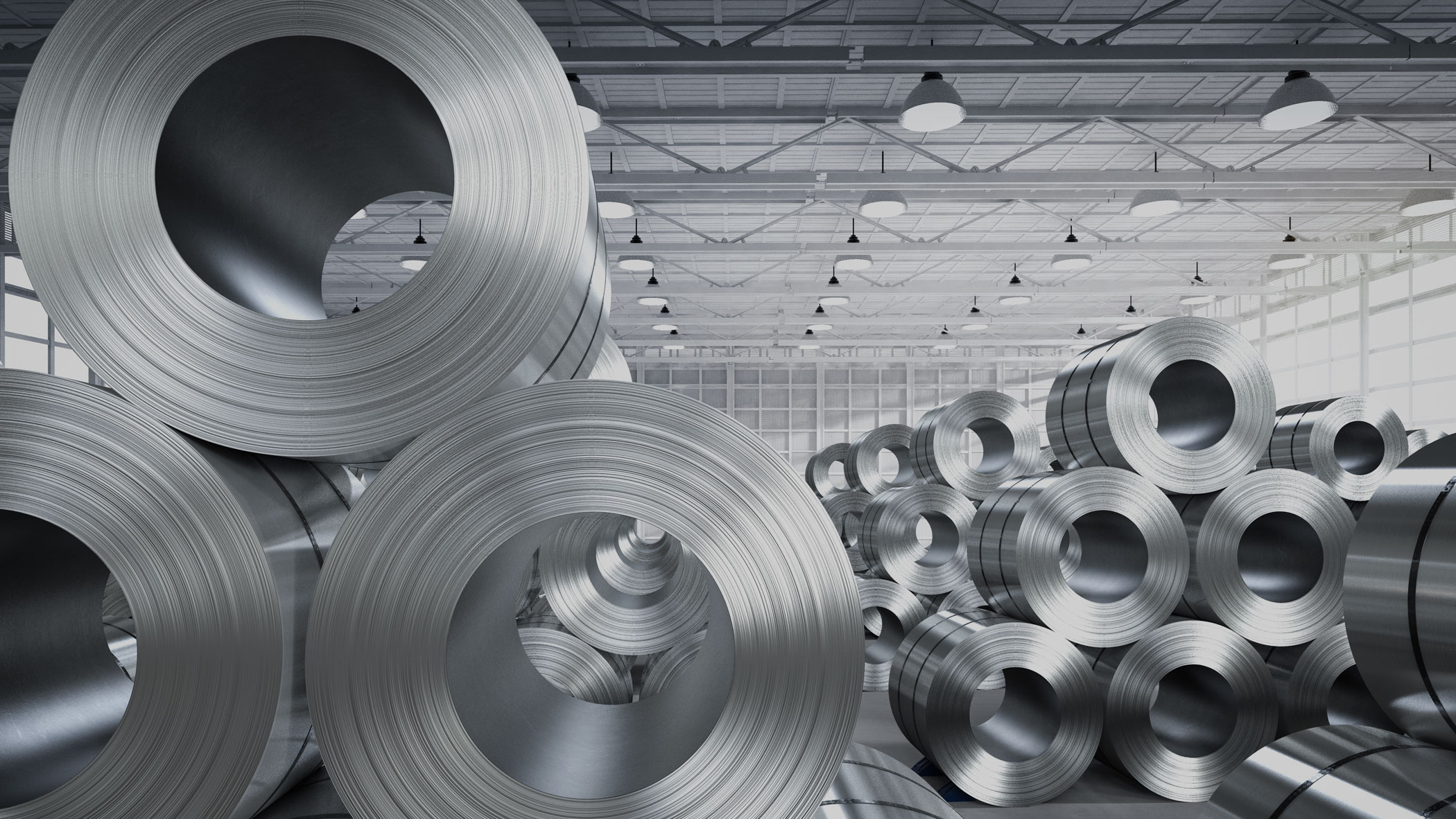 Warehouse full of metal coils stacked in groups of five